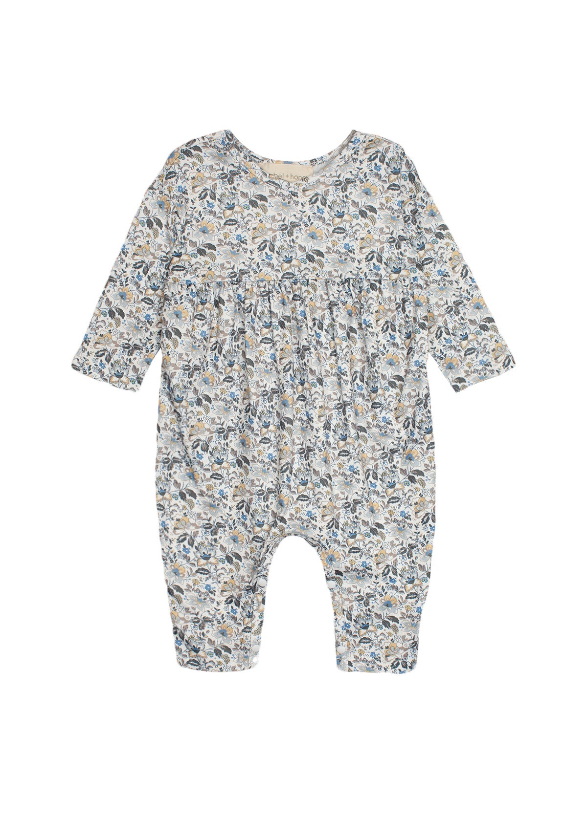 The Mabel and Honey Hazelnut Romper is a long-sleeved baby girl romper with a gathered waist and a blue, beige, and gray floral print, shown flat on a white background.