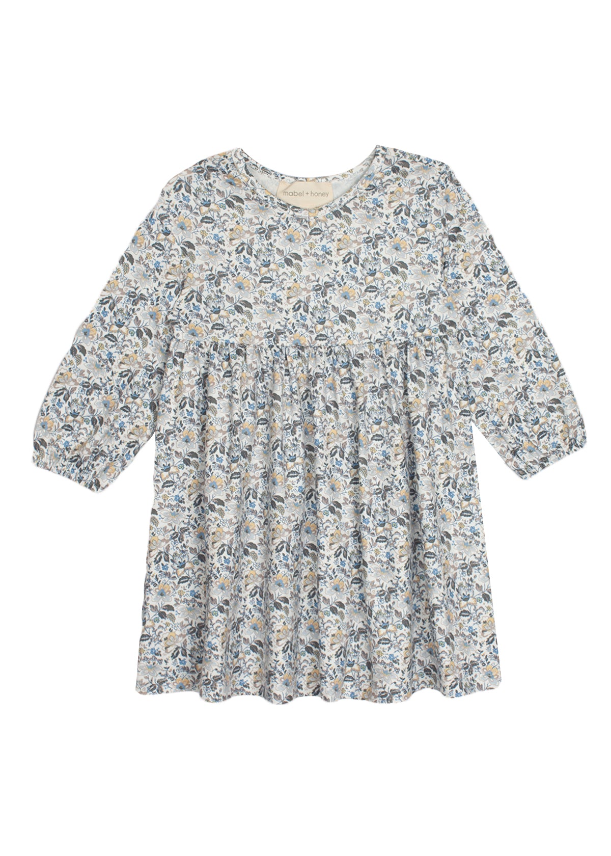 The Hazelnut Dress by Mabel and Honey is a girls long sleeve dress with a round neckline, gathered waist, and all-over blue, gray, and beige floral print on a light background—ideal for casual special occasions.