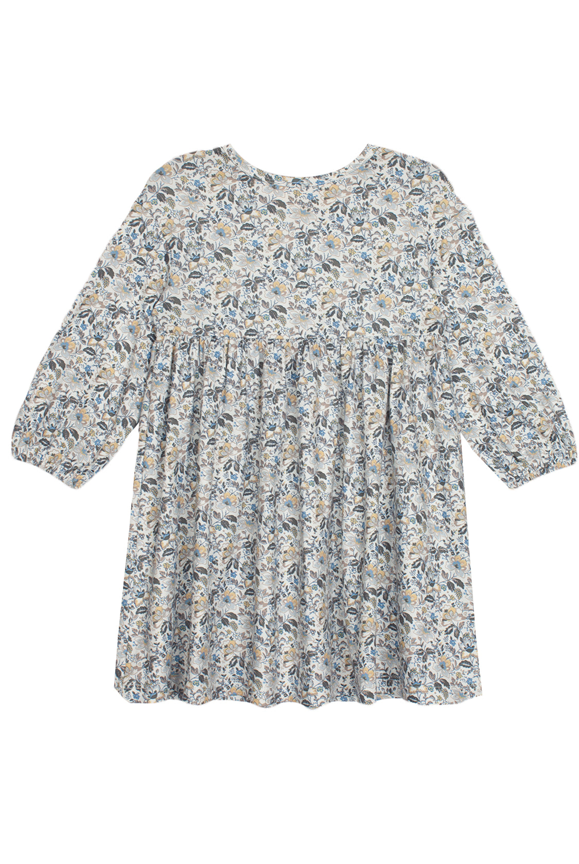 The Hazelnut Dress by Mabel and Honey is a loose-fitting, long sleeve girl’s dress with a high waist, blue-green-beige floral print, round neckline, flowy silhouette, and is ideal for casual special occasions.