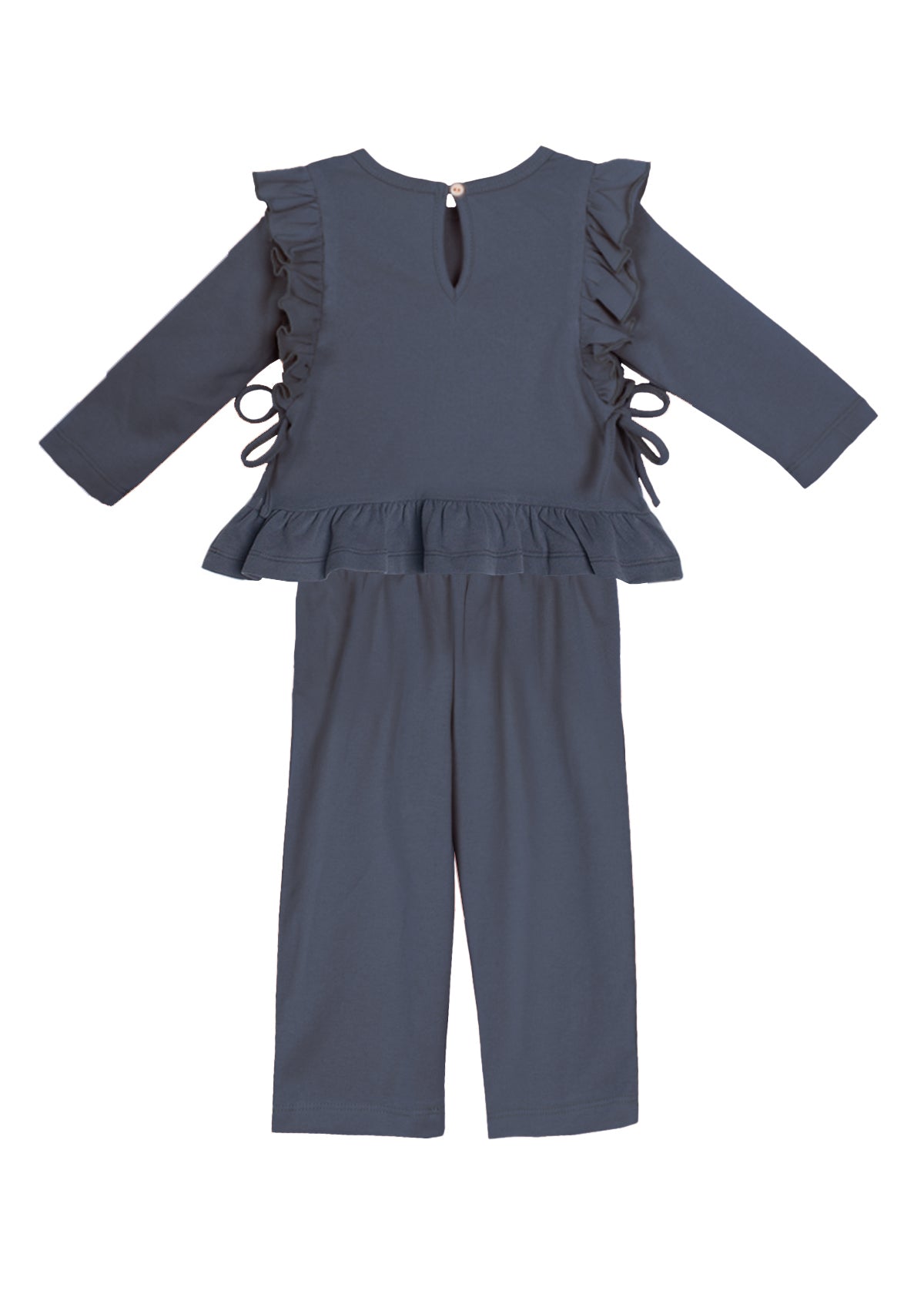 The Robyn Two Piece Set by Mabel and Honey features a dark blue cotton-blend, long-sleeve peplum top with ruffled shoulders, side ties, and back button, plus matching straight-leg pants—a charming outfit for children.