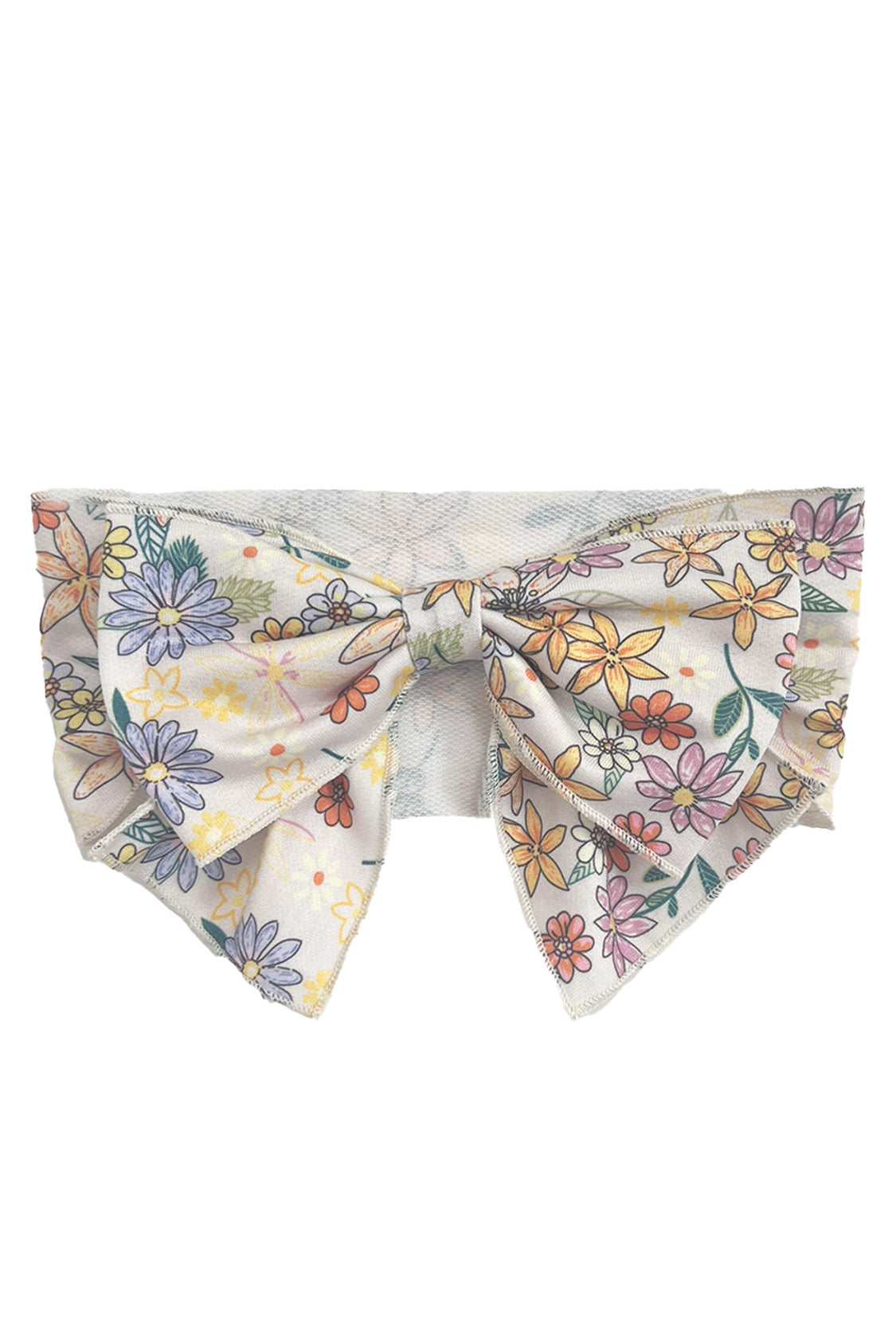 The Flower Field Hair Accessory by Mabel and Honey features a colorful floral print on white, with yellow, orange, purple, and pink flowers plus green leaves—perfect as an elegant statement hair bow.