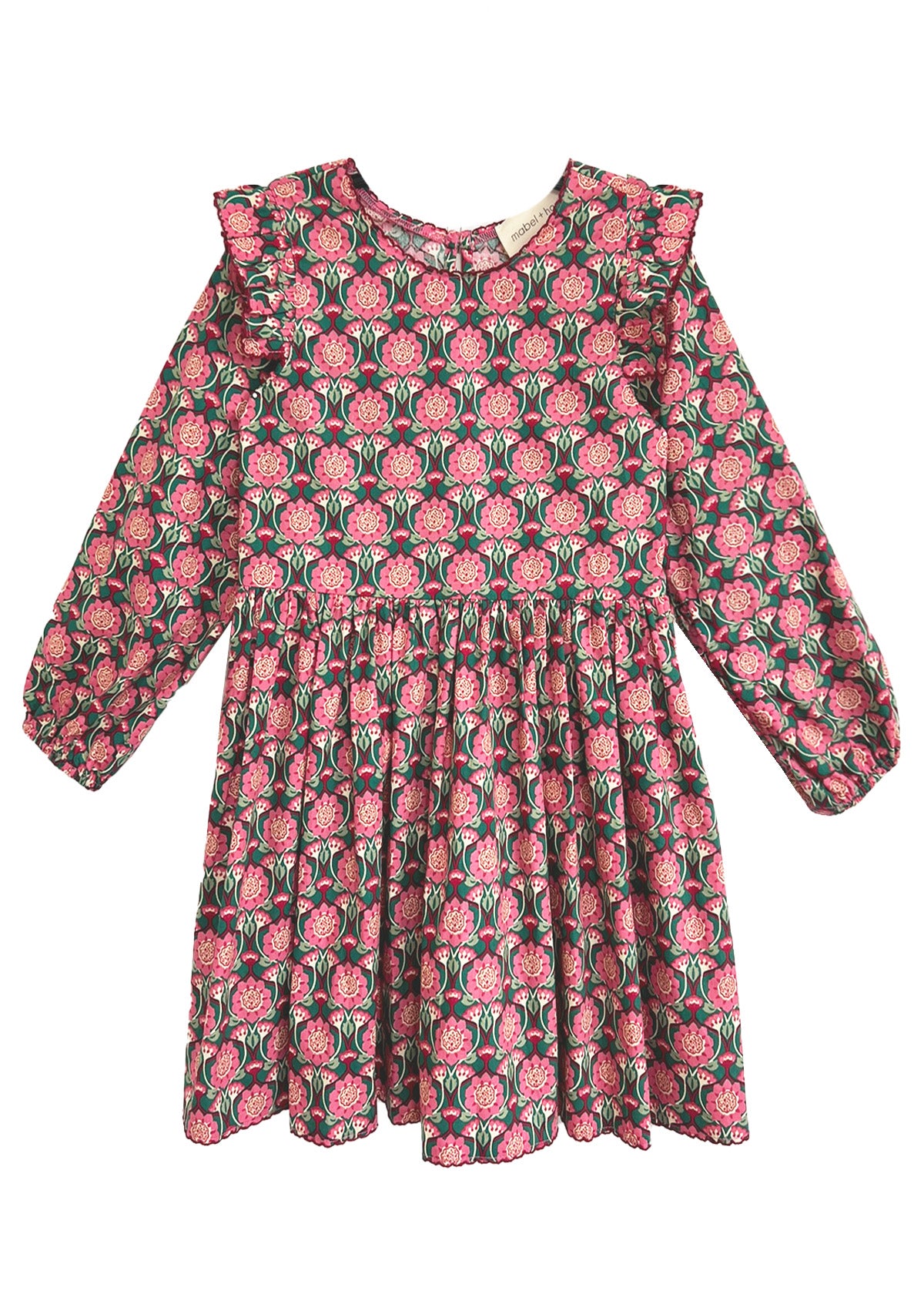 The Perfect in Pink Dress by Mabel and Honey features long sleeves, pink floral print, ruffled shoulders, and a gathered waist—knee-length and ideal for any occasion.