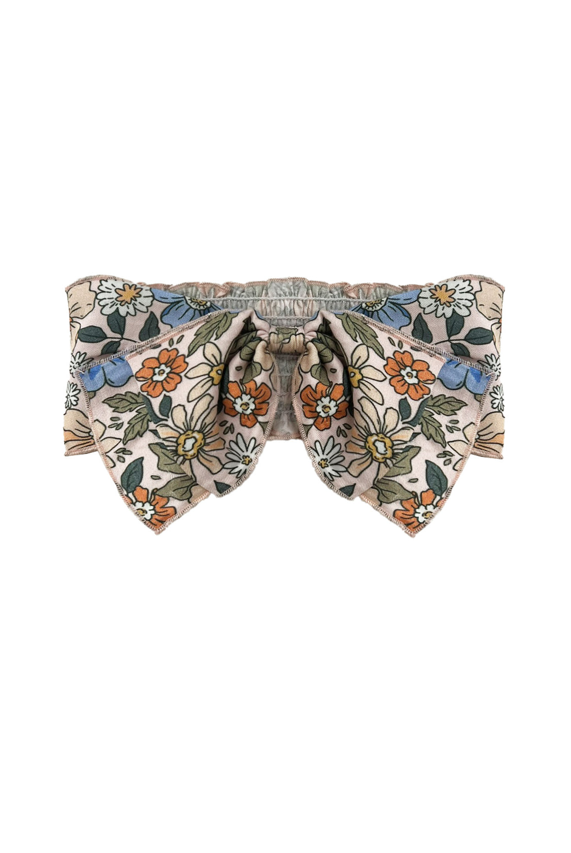 The Riley Hair Accessory by Mabel and Honey is a baby girl bow with orange, blue, and white flowers plus green leaves on beige. It features a gathered center and pointed ends for added charm.