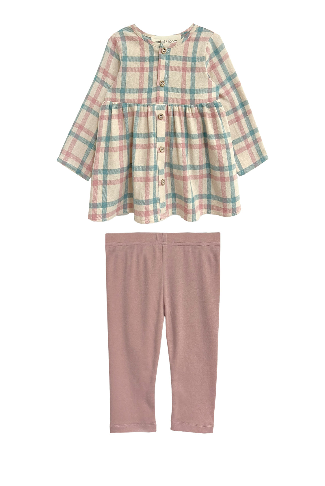 The Mabel and Honey Phoebe Two Piece Set includes a pastel plaid top and solid light pink leggings, offering a charming and comfy outfit for your child.