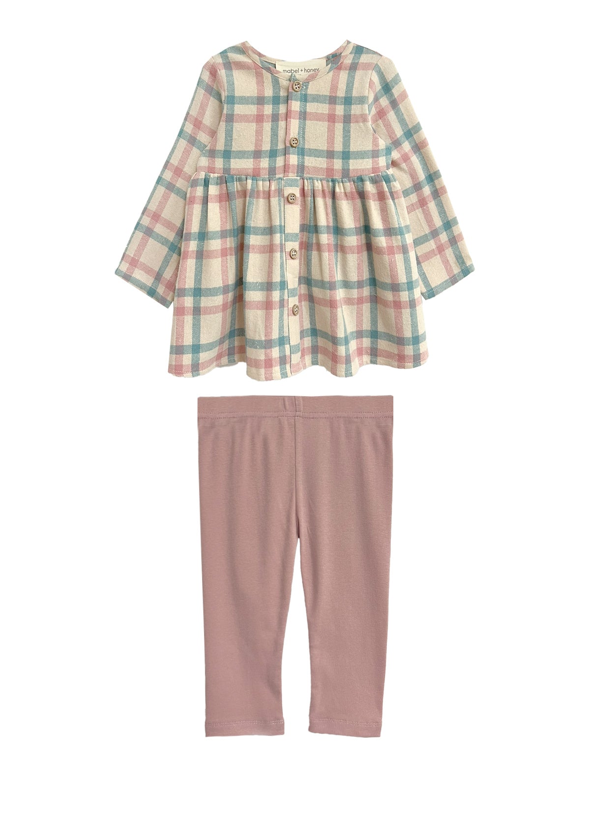 The Mabel and Honey Phoebe Two Piece Set includes a pastel plaid top and solid light pink leggings, offering a charming and comfy outfit for your child.