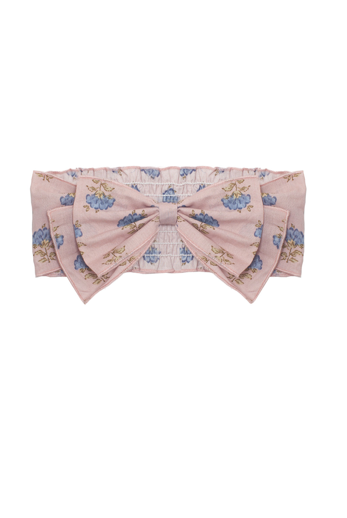 The Lavender Mae Hair Accessory by Mabel and Honey showcases a large pink bow in soft fabric, detailed with a blue and green floral pattern.