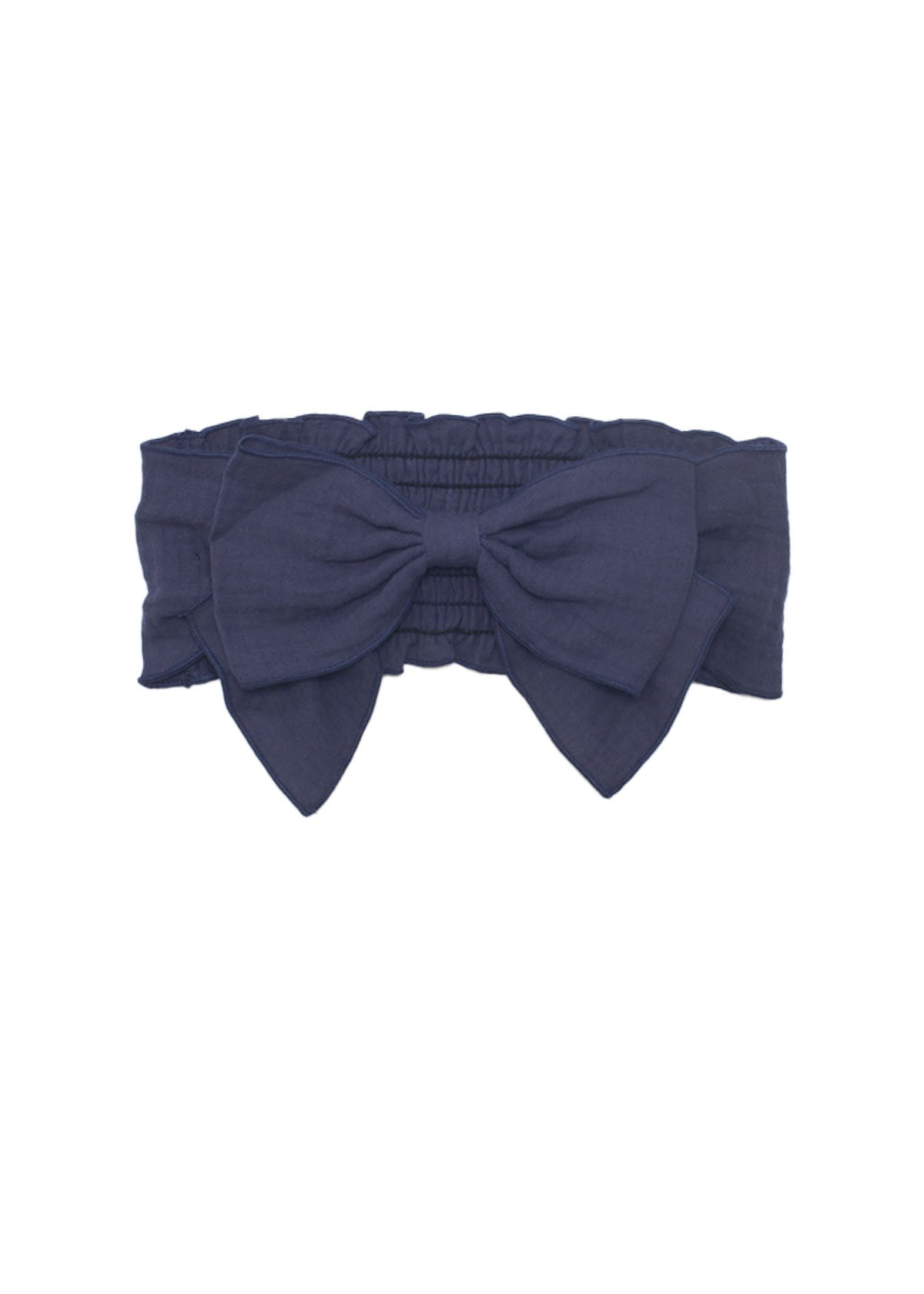 The Clara Hair Accessory by Mabel and Honey is a dark blue headband with an oversized center bow and an elastic back for a secure fit.