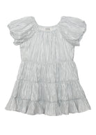 The Sparkle and Spin Silver Dress by Isobella and Chloe features shiny silver fabric, short sleeves, a pleated texture, a ruffled tiered skirt, and a loose, flowy fit—ideal as a party dress that shimmers.