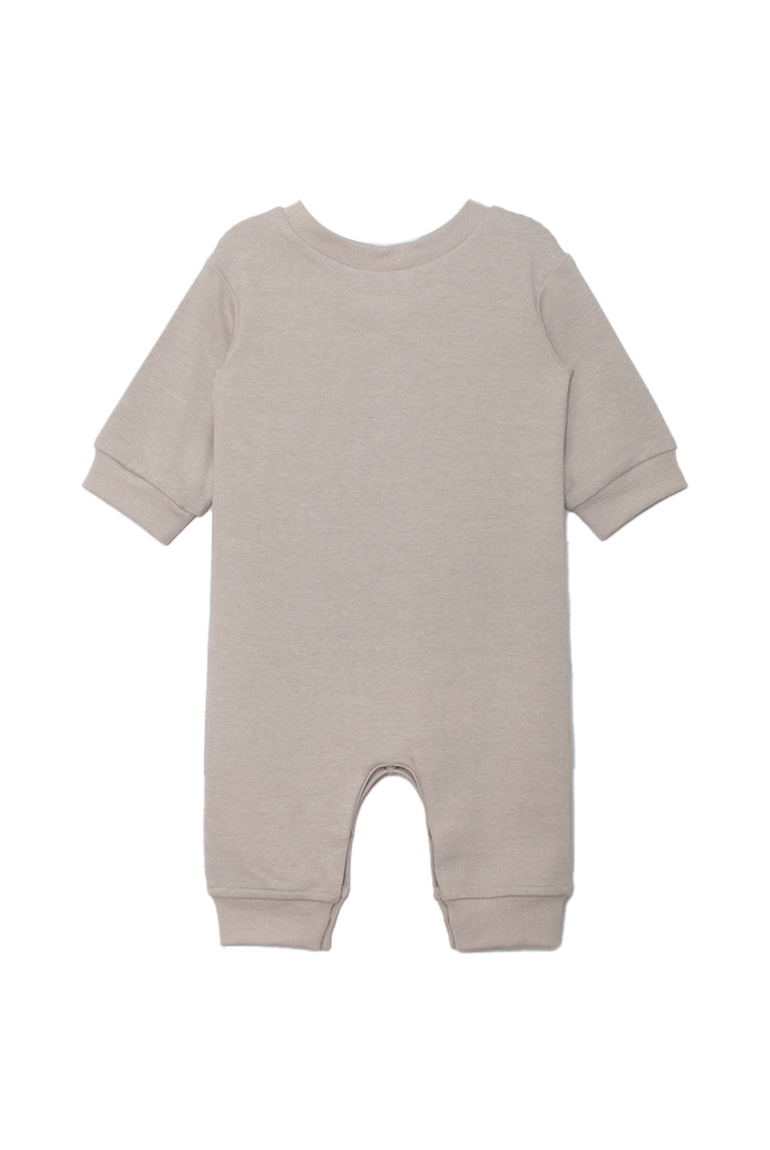 The Beckett and Bear Isaac Romper is a light beige, neutral-tone one-piece with cuffed sleeves and legs. Shown flat from the back, its simple solid design has no visible patterns or decorations.
