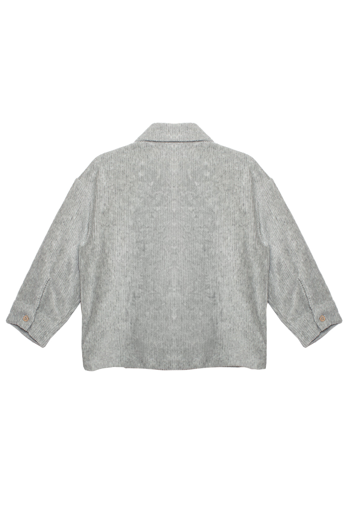 The Grayson Jacket by Beckett and Bear is a light gray corduroy kids layering jacket with long sleeves, a collar, and buttoned cuffs. Shown from the back on a white background, its subtle textured pattern adds stylish detail.