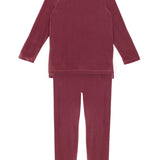 The Sugar Plum Velour Two Piece Set from Mabel + Honey features a cozy long-sleeve top and leggings in soft burgundy fabric, displayed flat on a white background—perfect for girls who love both comfort and style.