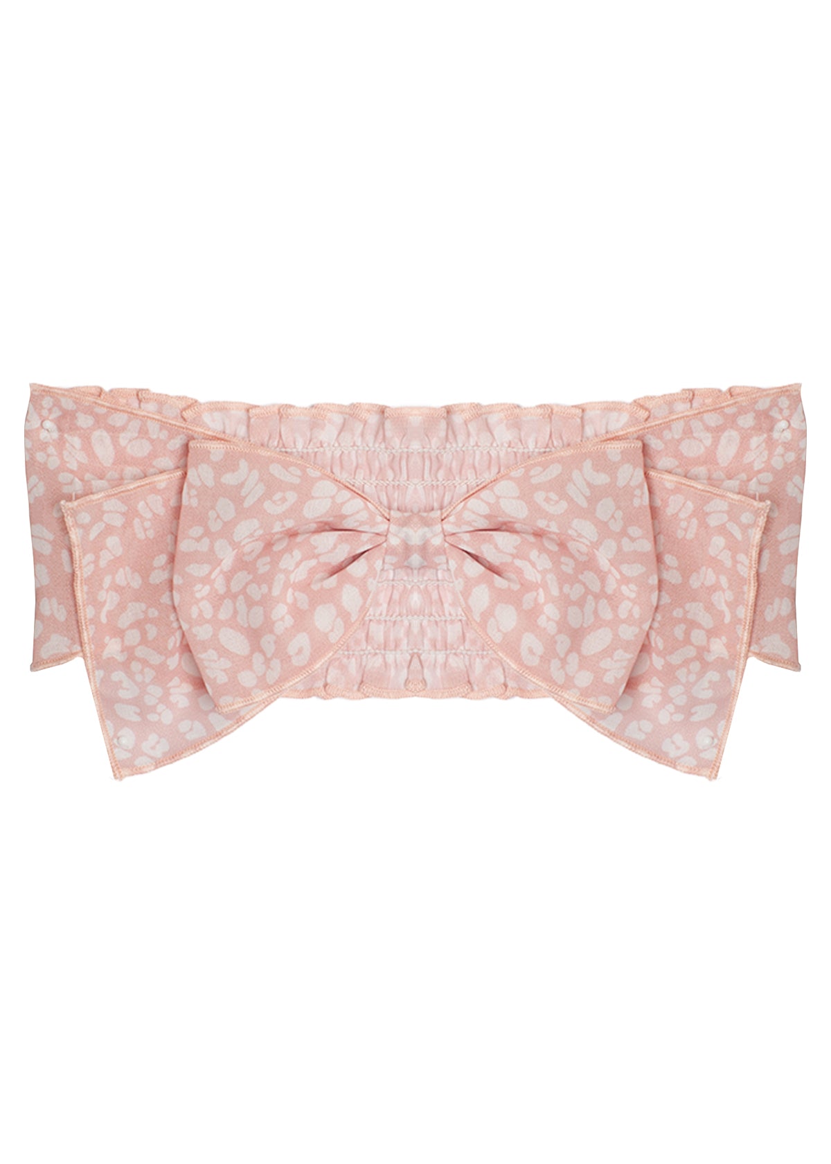 The Wildflower Headband by Mabel and Honey is a light pink fabric baby accessory with a white leopard print and gathered center detailing.