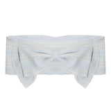 The Payton Headband by Mabel and Honey features light blue plaid cotton and a large decorative front bow—an adorable accessory that's perfect for baby outfits or as a cute hairpiece.