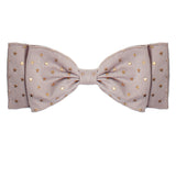 The Skylar Purple Hair Clip by Mabel and Honey features a light purple heather print with small gold stars. Made from 100% cotton, this accessory is perfect for babies and is shown on a white background.