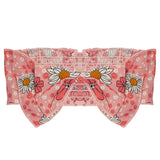 The Pink Power Hair Clip by Mabel and Honey is a pink, floral cotton accessory with white daisies, yellow centers, a ruffled edge, and a bow shape—ideal as a cute baby hair accessory.
