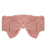 The Sweet Rasberry Headband by Mabel and Honey is a pink 100% cotton headband, featuring a large front bow and an elastic, gathered back band.