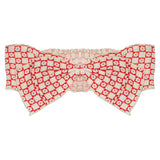 The Mabel and Honey Little Red Wagon Headband is a cute fabric headband with a big red-and-white checkered bow, small white flower details, and an elastic back—perfect for your baby.