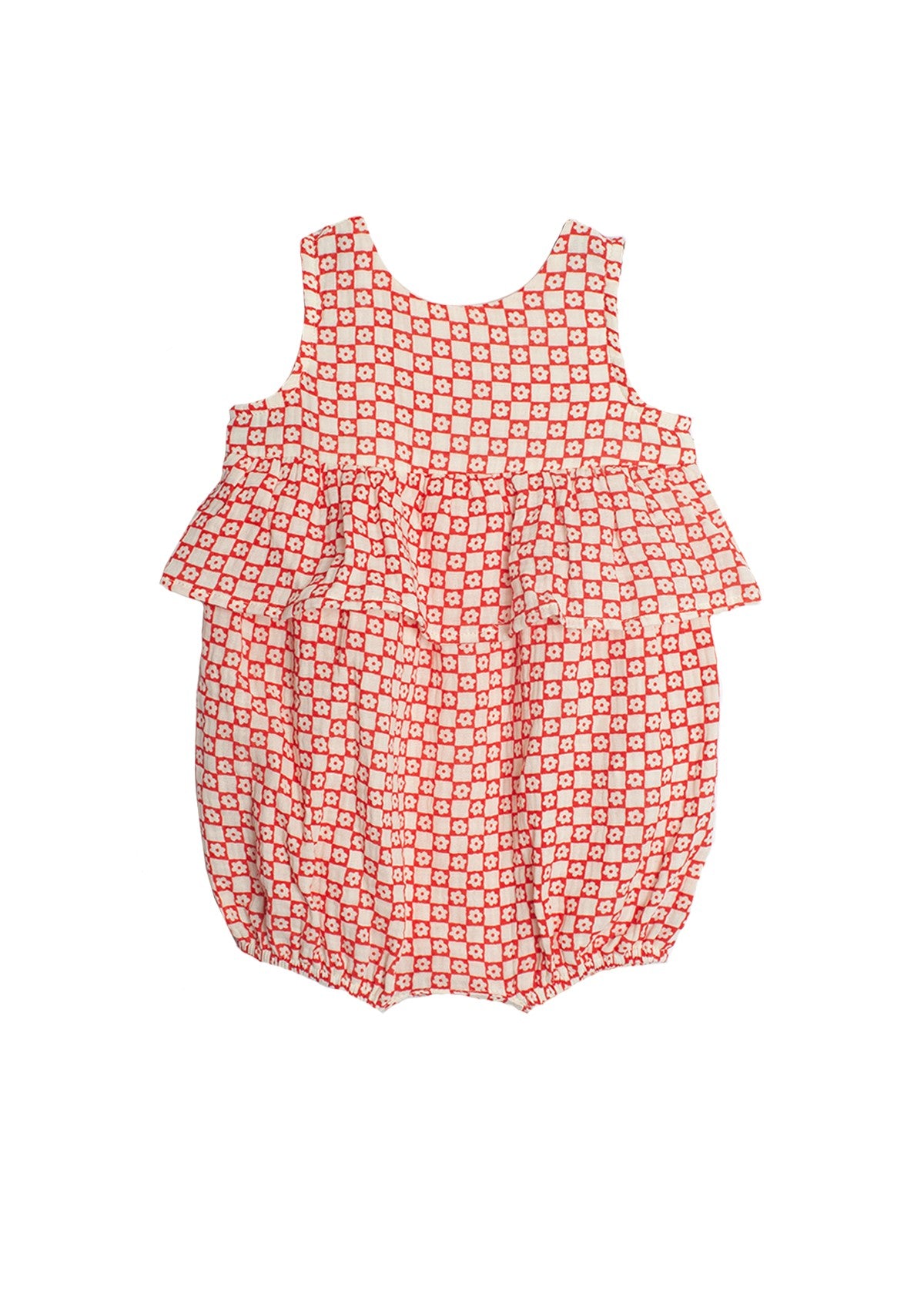 The Little Red Wagon Baby Romper by Mabel and Honey is a sleeveless cotton romper with a ruffle waist, white background, red and white geometric square pattern, and elasticated leg openings—perfect for style and comfort.