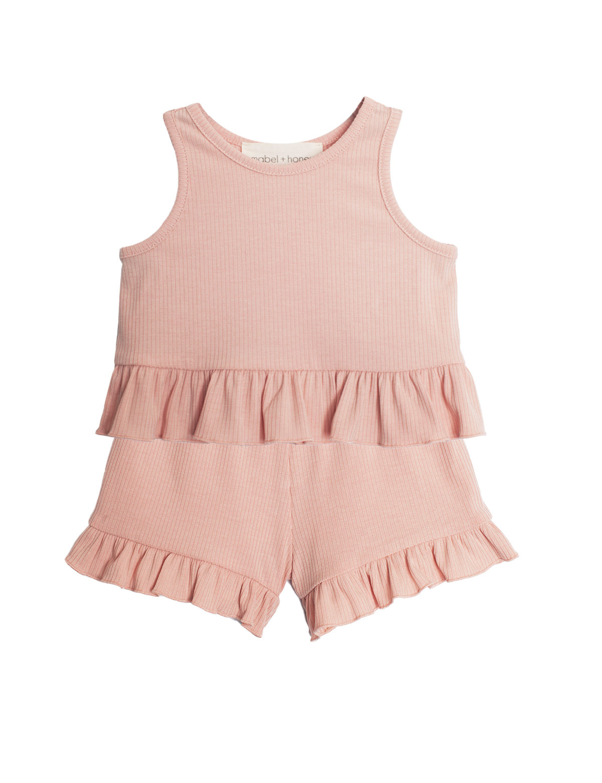 The Mabel and Honey Pink Petals Two Piece Short Set features a light pink, sleeveless style with ruffled waist and hem, crafted from ribbed fabric—an adorable summer outfit for toddlers.