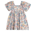 The Flower Mae Floral Dress by Mabel and Honey is a knee-length girl's dress with puff sleeves, a square neckline, and a vintage-inspired floral print on a light background—perfect for young girls.