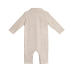 The Millie Brothers Romper by Beckett and Bear is a beige, long-sleeved romper with a collared neckline, shown from the back and laid flat on a white background.