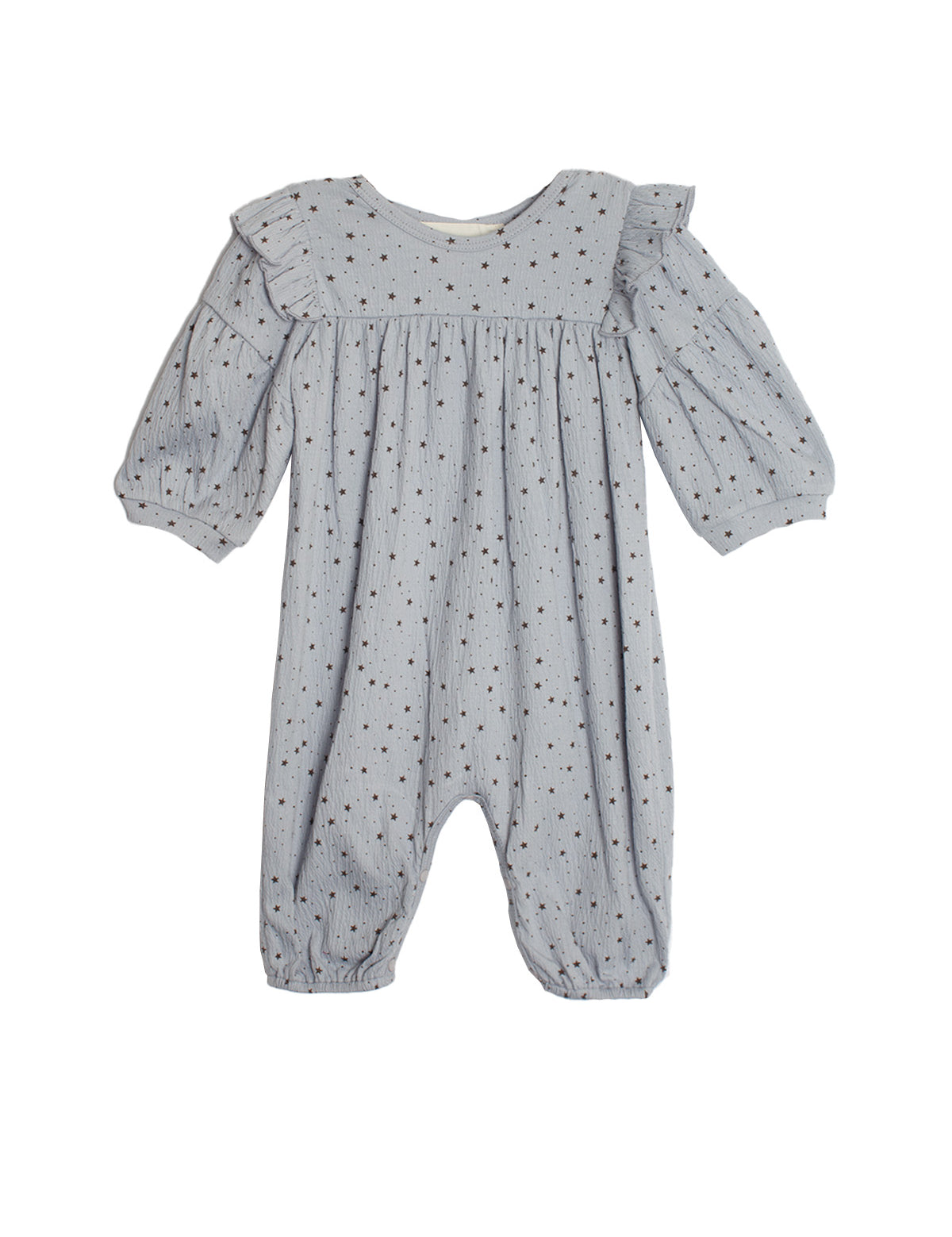 The Mabel and Honey Twinkle Twinkle Romper features light blue-gray fabric with small black polka dots, ruffle shoulders, gathered cuffs at wrists and ankles, and a loose, comfy fit for girls.