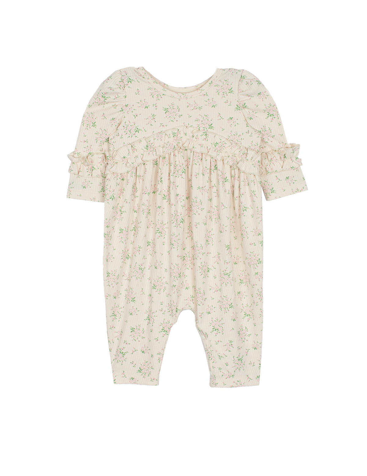 The Mabel and Honey Breakfast in Bed Romper is a cream-colored baby girls’ piece with a green floral print, ruffled sleeves, and gathered fabric for a soft, vintage-inspired look.