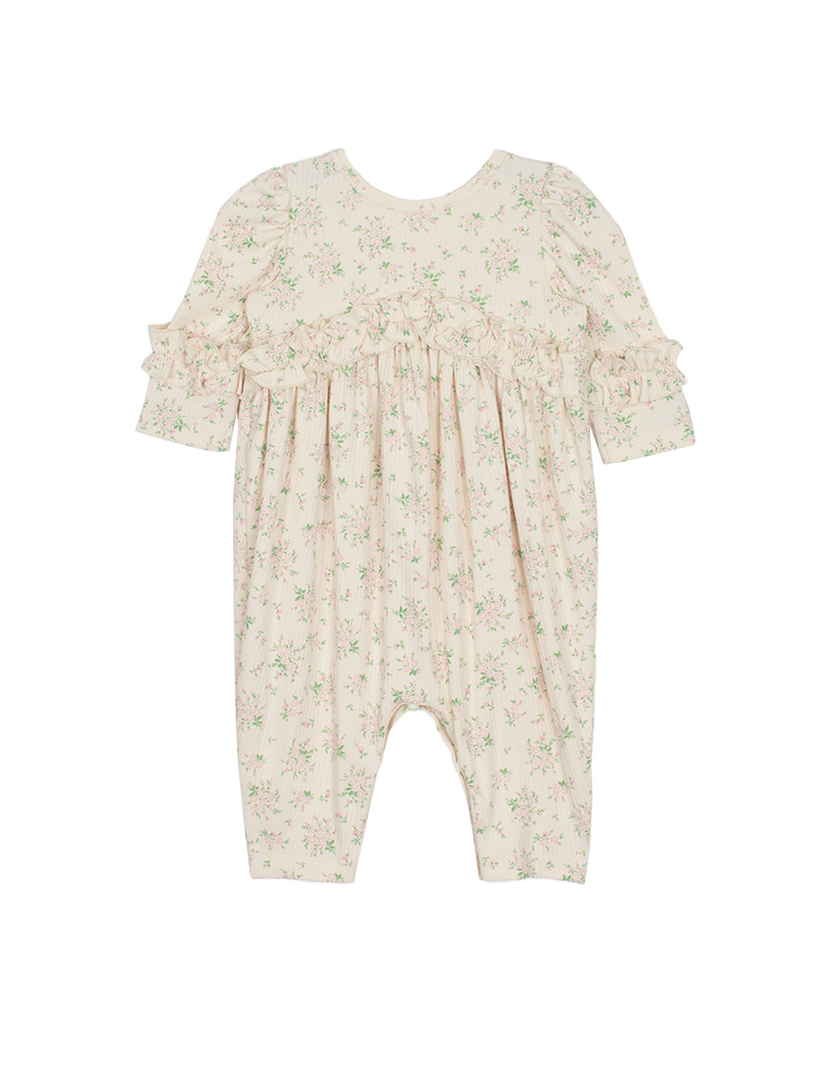The Mabel and Honey “Breakfast in Bed Romper” is a cream-colored long-sleeve baby girls romper with ruffled sleeves, chest and cuff accents, and a delicate green floral pattern. Displayed flat on a white background.
