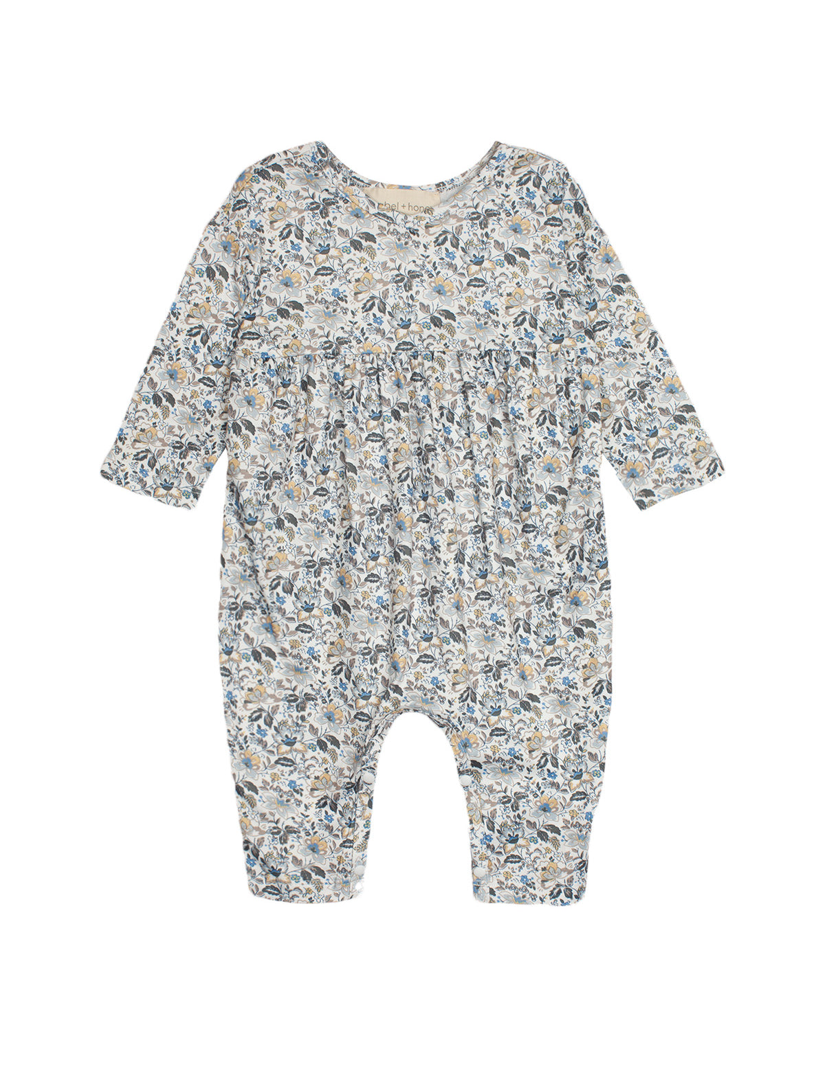 The Mabel and Honey Hazelnut Romper is a long-sleeved baby girl romper with a gathered waist and a blue, beige, and gray floral print, shown flat on a white background.