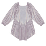 The Glitz and Glam Party Dress by Mabel + Honey features shimmery lavender fabric, a square neckline, long puffed sleeves, and an asymmetrical hem—perfect for girls' parties. Displayed on a white background.