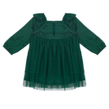 The Mistletoe Emerald Dress by Isobella and Chloe features long sleeves, ruffled shoulders, a buttoned keyhole neckline, and a layered tulle skirt—perfect for holiday celebrations.