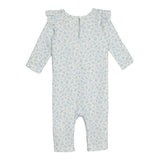The Hannah Romper by Mabel and Honey is a long-sleeved cotton baby romper featuring a light blue floral print, ruffled shoulders, a round neckline, and a back button closure for easy dressing.