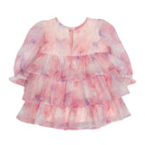 The Isobella and Chloe Berry Swirl Watercolor Print Dress is a pink and purple kids’ dress with long puffy sleeves, three ruffled tiers, a round neckline, and a back button closure.