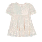 The Isobella and Chloe Taylor Sequined Little Big Girl Dress is a short-sleeved, light pink dress with a tiered skirt and vertical shimmering sequins, shown on a white background.