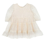 The Isobella and Chloe Heart of Gold Little Big Girl Dress, featuring an ivory tulle design with long sleeves, a ruffle skirt, and gold polka dots, is shown against a white background.