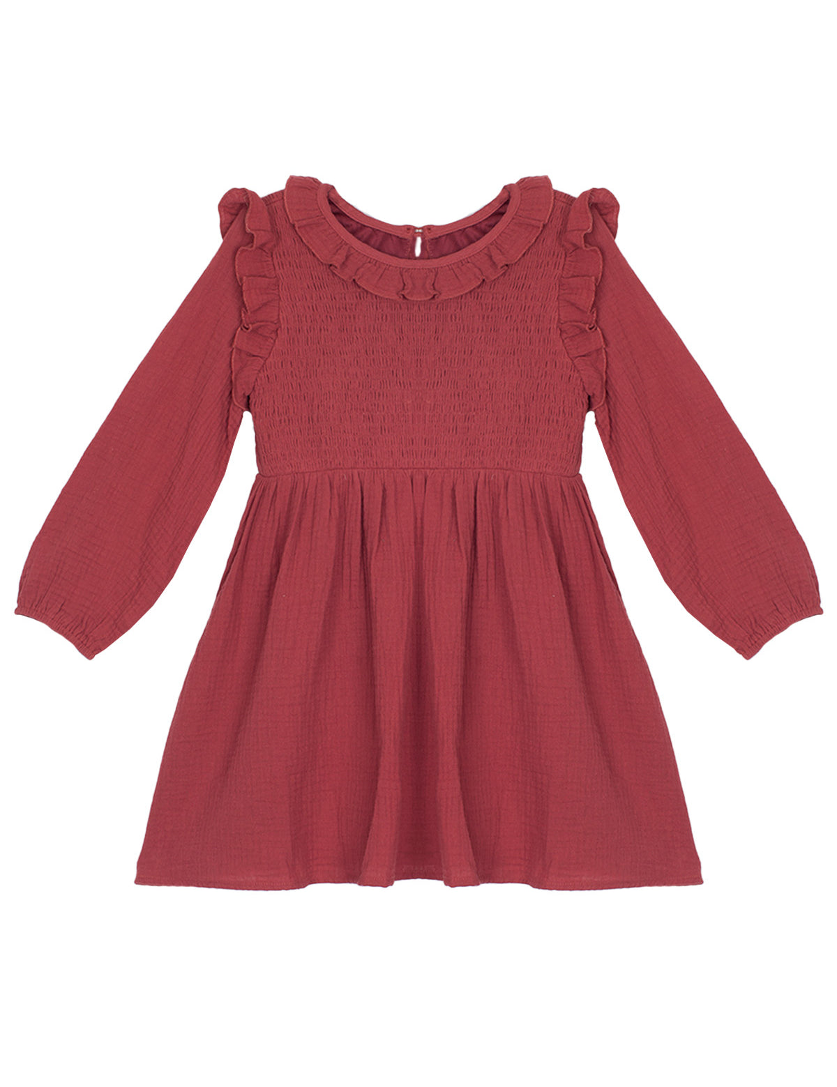 The Mabel and Honey Autumn Dress Red is a children’s knee-length, long-sleeve dress with shoulder ruffles and a smocked bodice, finished with a round neckline.