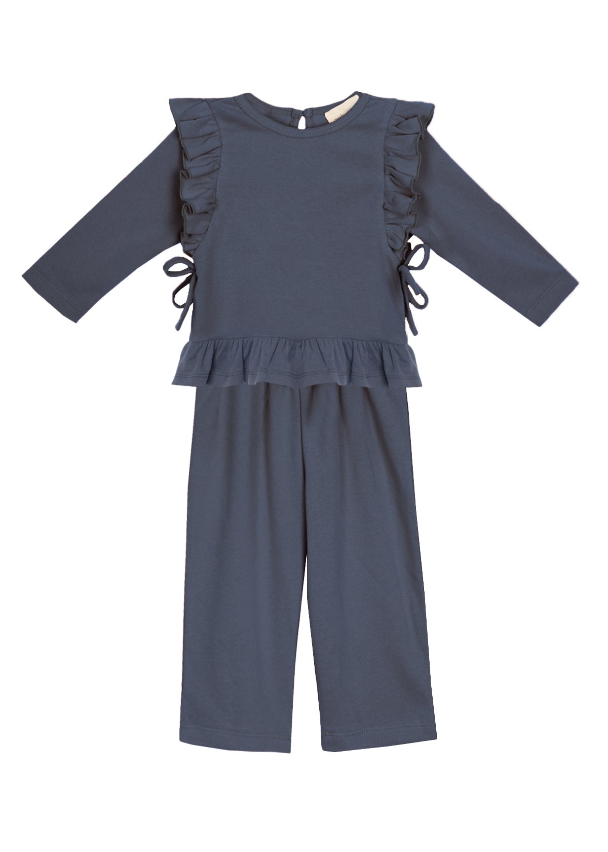 The Robyn Two Piece Set by Mabel and Honey features a navy peplum top with ruffled sides and hem, paired with matching wide-leg pants in a soft cotton blend, shown against a white background.