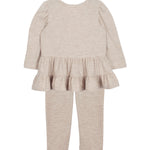 The Millie Two Piece Set by Mabel and Honey is a beige toddler outfit with a long-sleeve ruffle peplum top and matching leggings, displayed flat on a white background.