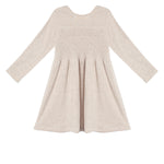 The Millie Natural Waist Dress by Mabel and Honey in light beige features a smocked bodice, long sleeves, and a gathered flared skirt, shown laid flat on a white background, back view.