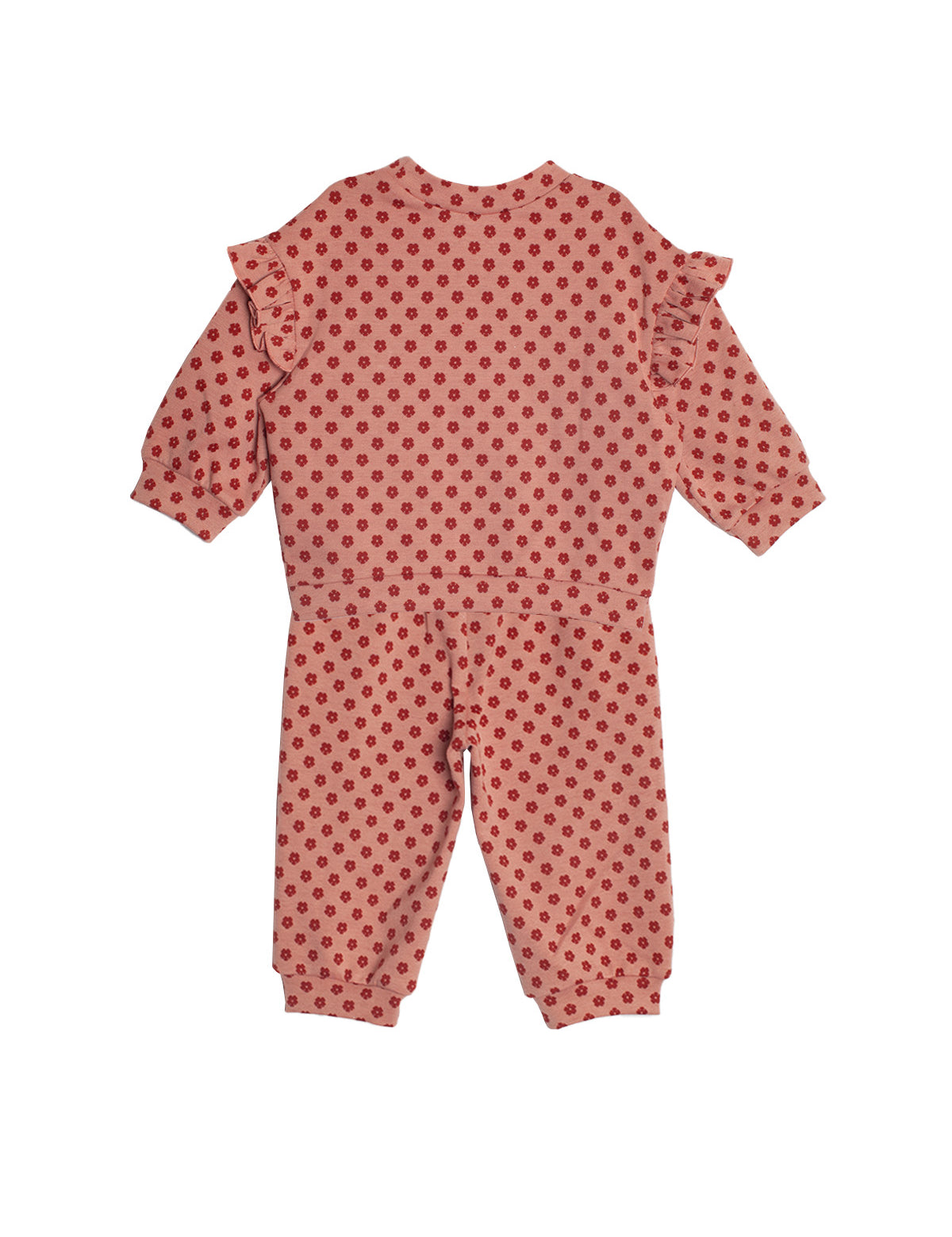 The Red Velvet Two Piece Set by Mabel and Honey features a pink toddler jumpsuit with long sleeves, ruffled shoulders, and red polka dots in soft knit fabric, shown flat on a white background.
