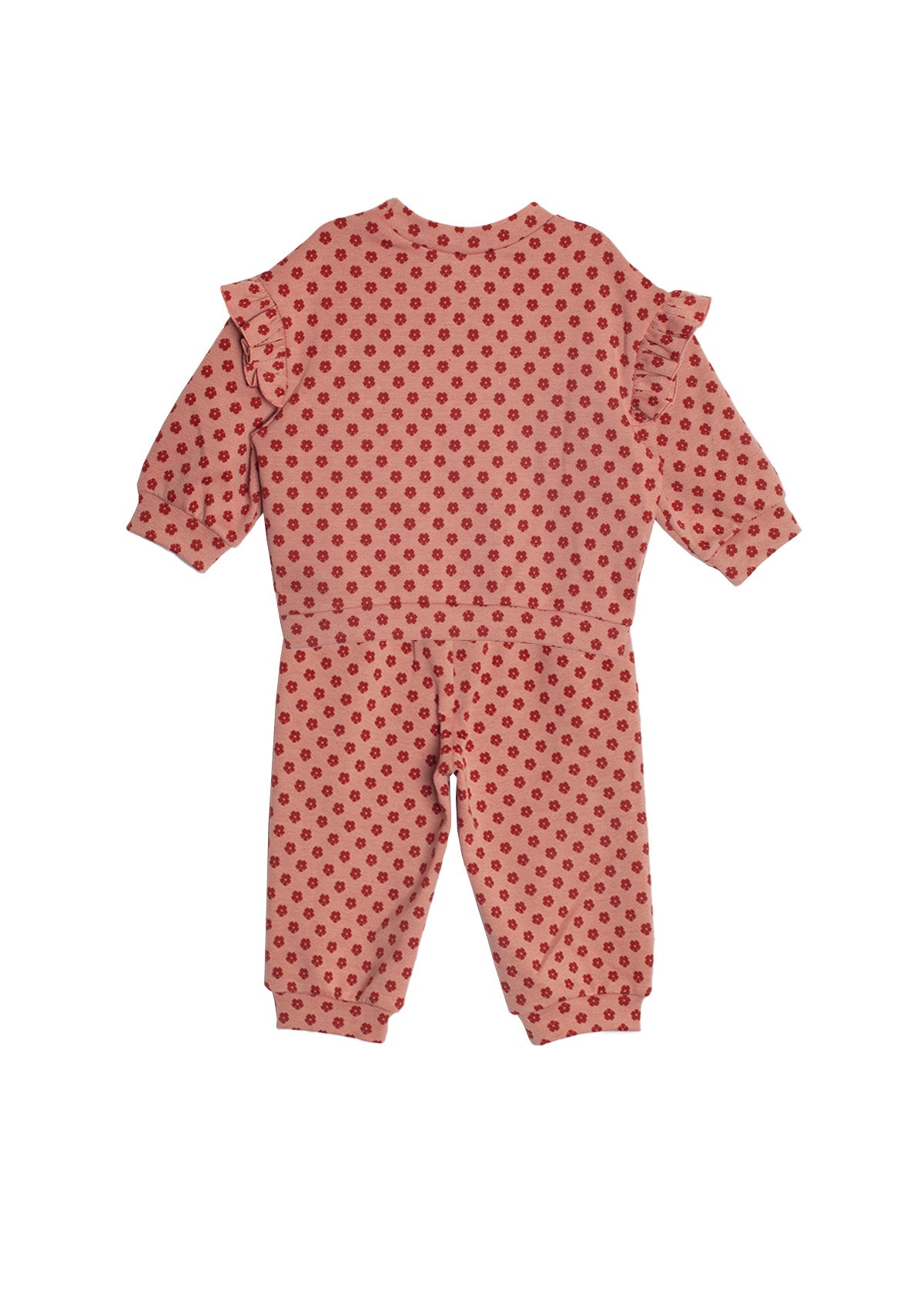 The Red Velvet Two Piece Set by Mabel and Honey features a pink toddler jumpsuit with long sleeves, ruffled shoulders, and red polka dots in soft knit fabric, shown flat on a white background.
