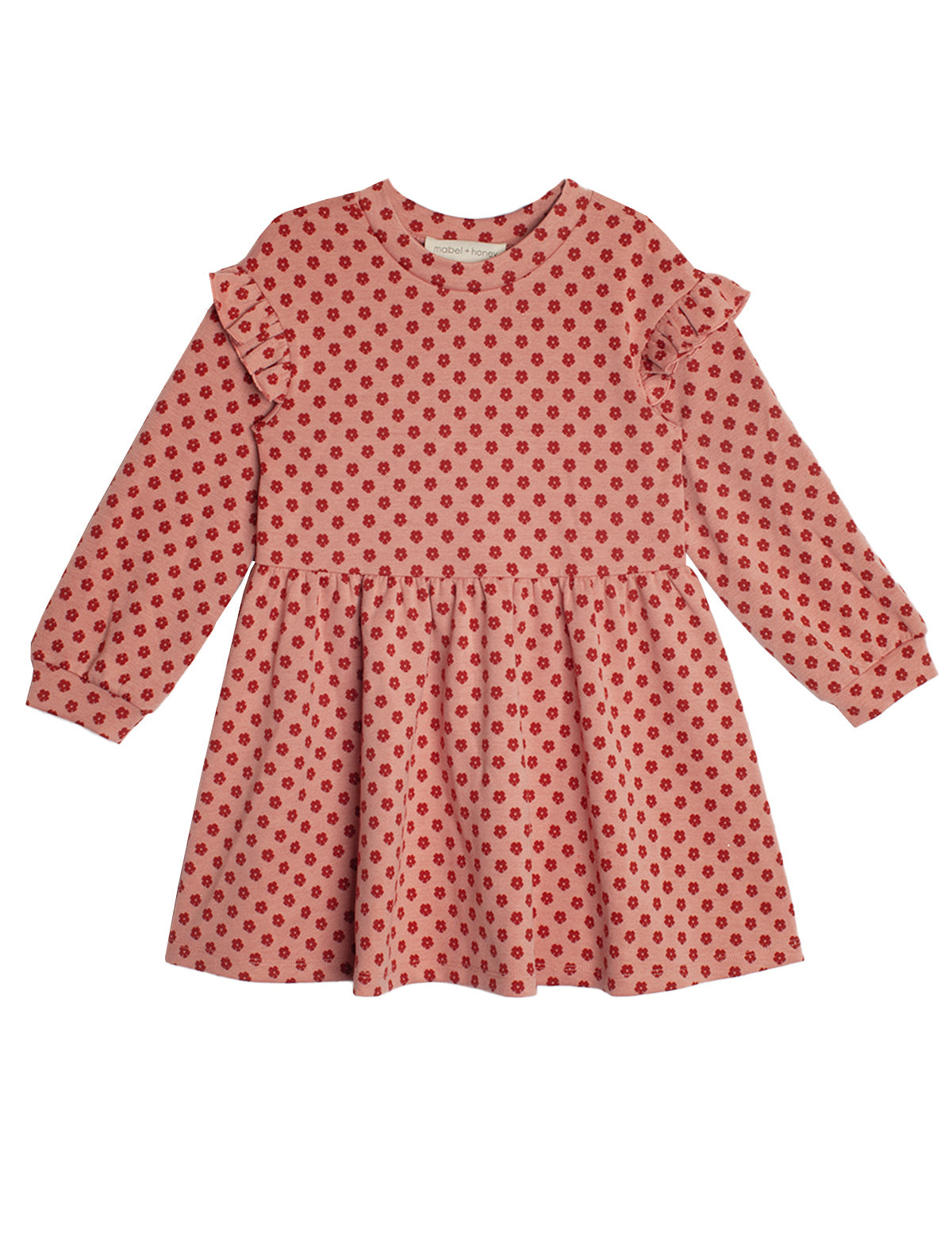 The Red Velvet Dress by Mabel and Honey features long sleeves, ruffled shoulders, a gathered skirt, and playful red polka dots for a charming, feminine look.
