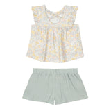 The Mila Two Piece Set by Mabel and Honey features a pastel-printed sleeveless top with ruffled shoulders and loose sage green shorts, displayed flat on a white background.
