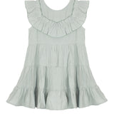 The Mila Green Emerald Dress by Mabel and Honey features a sage green hue, ruffled collar, flowy tiered layers, and loose fit—perfect for any occasion. Shown on a white background.