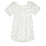 The Bluebell Baby Romper by Mabel and Honey features a white design with blue floral print, gathered neckline, puff sleeves, and a gently ruffled hem for a soft, delicate look.