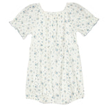 The Bluebell Baby Romper by Mabel and Honey features a white short-sleeve design with a square neckline, light blue floral pattern, subtle ruffled sleeves, and a loose gathered waist—an adorable choice for any occasion.