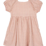 The Mabel and Honey Cranberry Crush Dress is a charming pink and white girls dress featuring puff sleeves, a gathered waist, striped pattern, and a playful square neckline.