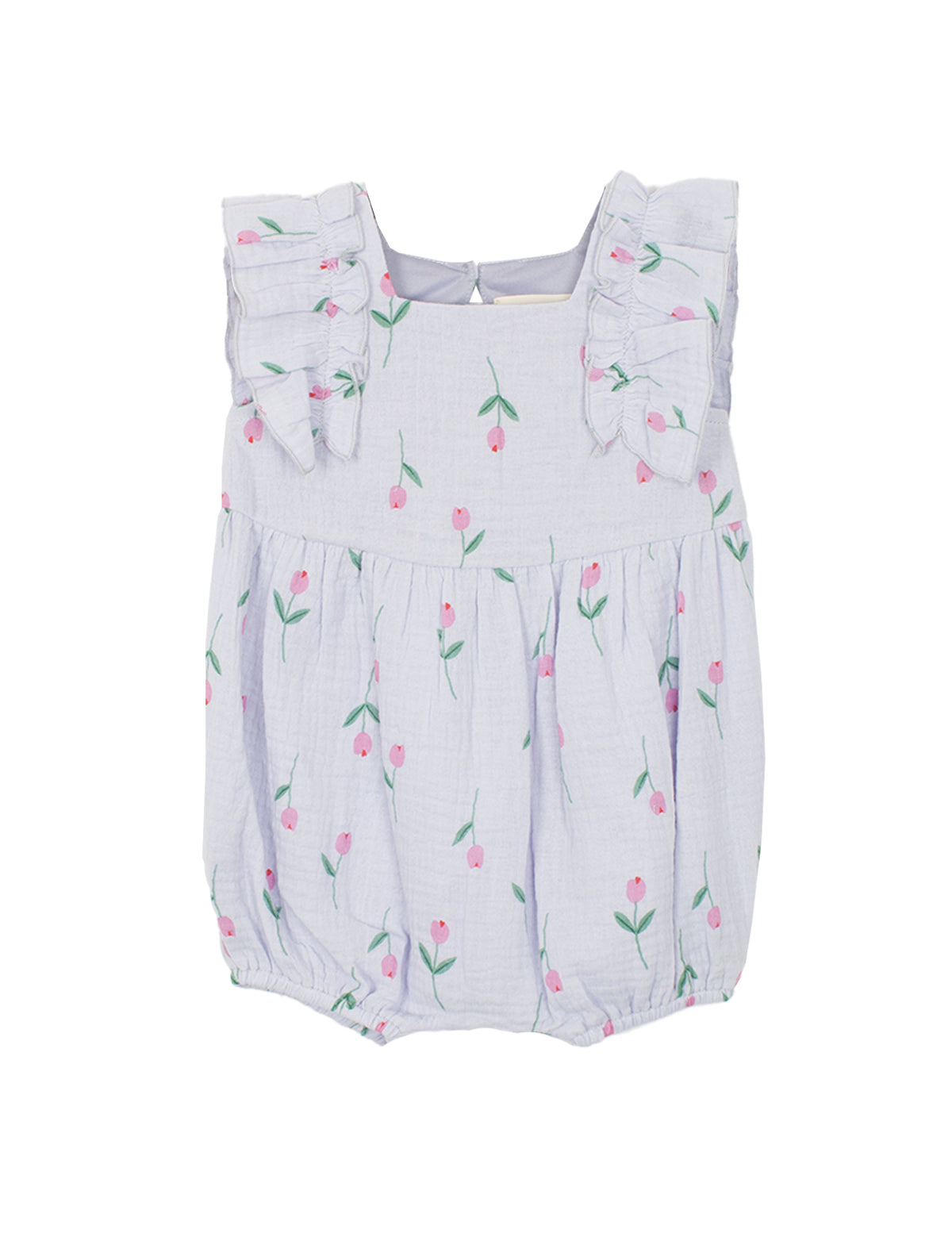The Mabel and Honey Tiny Tulip Baby Romper features soft, lightweight lavender gauze, ruffled shoulder straps, and a charming pattern of pink tulips with green stems.