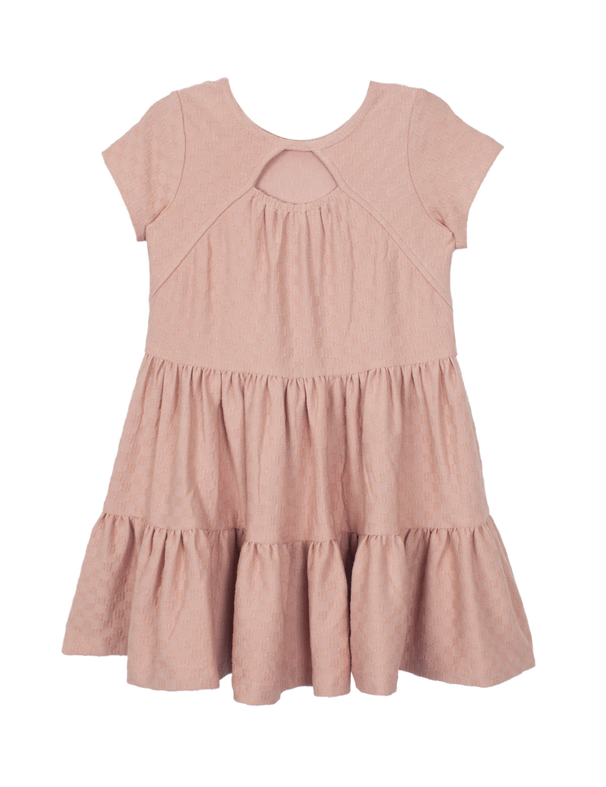 The Josie Dress by Mabel and Honey is a blush pink, short-sleeved girl's dress in soft terry cloth with a round neckline, teardrop cutout, and tiered ruffle skirt. Shown flat on a white background.