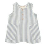 The Blake Baby Romper by Beckett and Bear is a sleeveless children’s romper made from 100% cotton with light blue and white stripes, wooden front buttons, and two large front pockets.